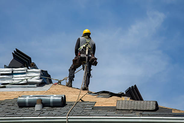 Professional Roof Replacement technician working in Salinas, CA